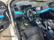 ✅ 2013 Mitsubishi Lancer Evolution MR • VIN: JA32W5FV1DU005325 • Lot: 61864435. Listed on Copart with Not provided. Free auction sales archive from the USA and detailed vehicle history report at DreamBid. Image 8.