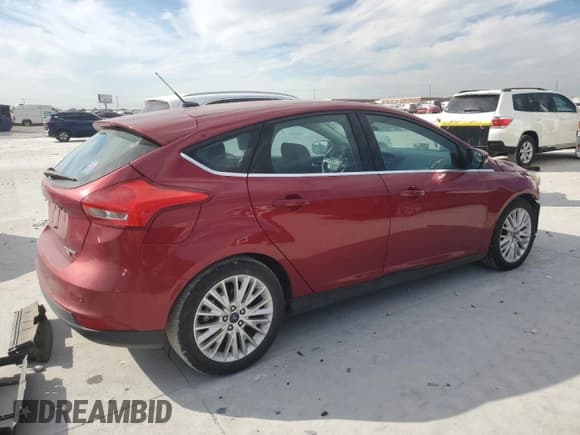 ✅ 2017 Ford Focus Titanium • VIN: 1FADP3N26HL294285 • Lot: 86214435. Wystawiony na Copart z przebiegiem 103 566 mil. Bezpłatny archiwum sprzedaży aukcyjnych z USA i szczegółowy raport historii pojazdu na DreamBid. Zdjęcie 3.