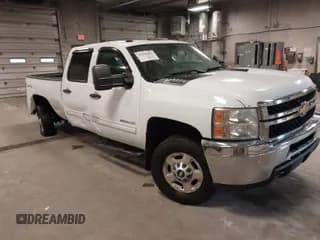 ✅ 2014 Chevrolet Silverado 2500HD LT • VIN: 1GC1KXCG5EF102897 • Lot: 41500574. Listed on IAAI with 185,117 mi. Free auction sales archive from the USA and detailed vehicle history report at DreamBid. Image 1.