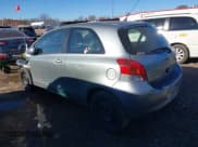 ✅ 2010 Toyota Yaris • VIN: JTDJT4K39A5284324 • Lot: 43705774. Listed on IAAI with 163,574 mi. Free auction sales archive from the USA and detailed vehicle history report at DreamBid. Image 3.