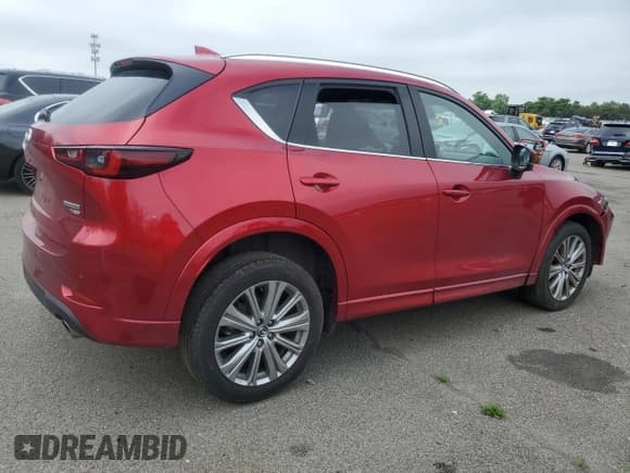 ✅ 2023 Mazda CX-5 Signature • VIN: JM3KFBXY9P0262213 • Lot: 62659365. Listed on Copart with 26,461 mi. Free auction sales archive from the USA and detailed vehicle history report at DreamBid. Image 3.