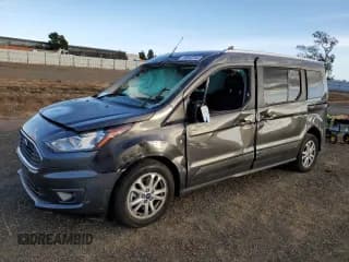 ✅ 2022 Ford Transit Connect XLT • VIN: NM0GE9F22N1544012 • Lot: 78942744. Listed on Copart with 33,652 mi. Free auction sales archive from the USA and detailed vehicle history report at DreamBid. Image 1.