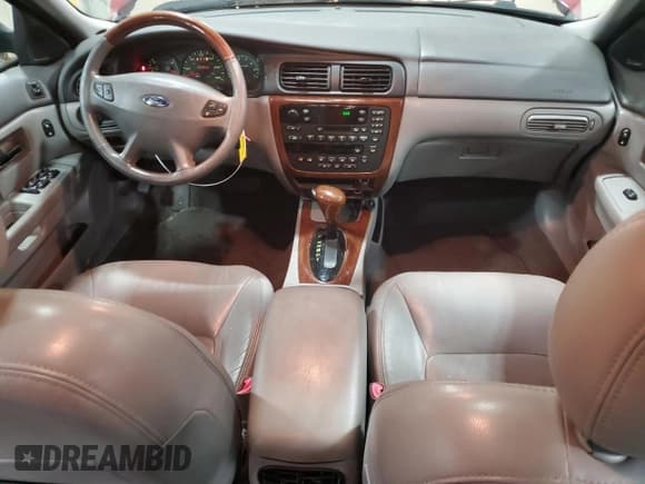 ✅ 2002 Ford Taurus SEL Deluxe • VIN: 1FAHP56S32G233519 • Lot: 59051105. Listed on Copart with 127,524 mi. Free auction sales archive from the USA and detailed vehicle history report at DreamBid. Image 8.