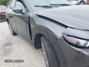 ✅ 2022 Mazda CX-30 S Carbon Edition • VIN: 3MVDMBCL2NM430767 • Lot: 43433804. Wystawiony na IAAI z przebiegiem 69 576 mil. Bezpłatny archiwum sprzedaży aukcyjnych z USA i szczegółowy raport historii pojazdu na DreamBid. Zdjęcie 18.