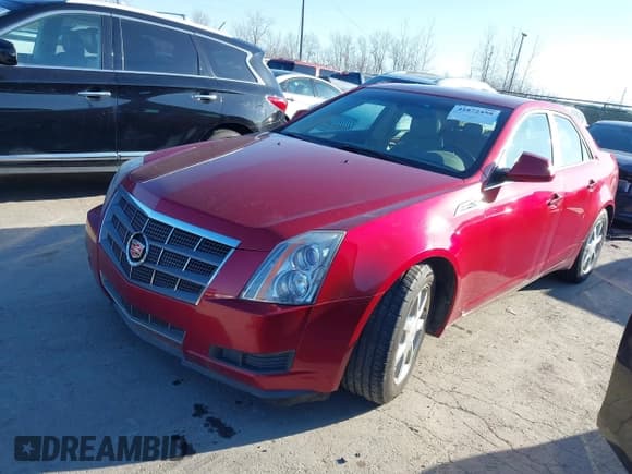 ✅ 2009 Cadillac CTS AWD • VIN: 1G6DS57VX90157075 • Lot: 41872458. Listed on IAAI with 173,886 mi. Free auction sales archive from the USA and detailed vehicle history report at DreamBid. Image 2.
