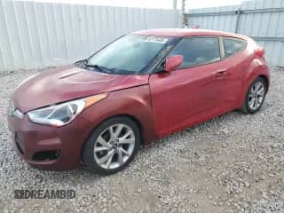 2016 Hyundai Veloster z VIN KMHTC6AD8GU279964, wystawiony jako Copart lot #82178485 z przebiegiem 85 105 mil mil oraz Czysty tytuł • Clean title. Historia ofert i sprzedaży dostępna na DreamBid. Obrazek 1.