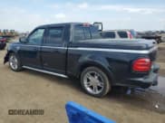 ✅ 2003 Ford F-150 Harley-Davidson • VIN: 1FTRW07373KD66326 • Lot: 59382485. Listed on Copart with 84,079 mi. Free auction sales archive from the USA and detailed vehicle history report at DreamBid. Image 2.