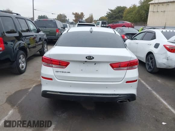 ✅ 2019 Kia Optima S • VIN: 5XXGT4L38KG372285 • Lot: 43799919. Listed on IAAI with 79,062 mi. Free auction sales archive from the USA and detailed vehicle history report at DreamBid. Image 16.