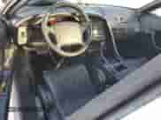 1993 Chevrolet Corvette z VIN 1G1YY23P8P5112521, wystawiony jako Copart lot #85591474 z przebiegiem 176 246 mil mil oraz Szkoda całkowita • Salvage title. Historia ofert i sprzedaży dostępna na DreamBid. Obrazek 8.