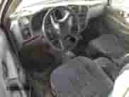 2003 Chevrolet S-10 z VIN 1GCCS19H438145781, wystawiony jako Copart lot #77011434 z przebiegiem Nie podano mil oraz Czysty tytuł • Clean title. Historia ofert i sprzedaży dostępna na DreamBid. Obrazek 8.