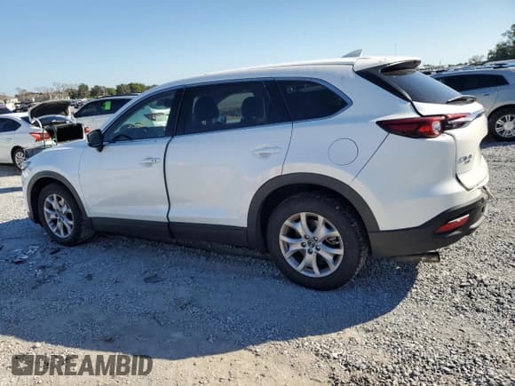 ✅ 2023 Mazda CX-9 Touring Plus • VIN: JM3TCBAY8P0640950 • Lot: 82341965. Wystawiony na Copart z przebiegiem 60 900 mil. Bezpłatny archiwum sprzedaży aukcyjnych z USA i szczegółowy raport historii pojazdu na DreamBid. Zdjęcie 2.
