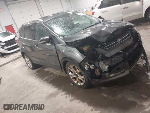 ✅ 2015 Ford Escape Titanium • VIN: 1FMCU9JX5FUA35888 • Lot: 41209408. Listed on IAAI with 125,378 mi. Free auction sales archive from the USA and detailed vehicle history report at DreamBid. Image 1.