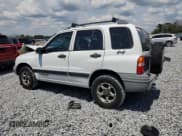 ✅ 1999 Chevrolet Tracker • VIN: 2CNBJ13CXX6914447 • Лот: 64100275. Опубликован ранее на Copart с пробегом 245 410 миль. Бесплатный доступ к архиву аукционных продаж из США и подробный отчёт об истории автомобиля на DreamBid. Изображение 2.