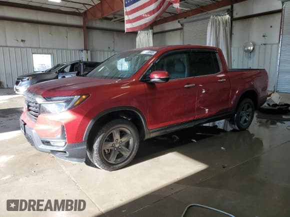 ✅ 2023 Honda Ridgeline RTL-E • VIN: 5FPYK3F70PB045641 • Лот: 86809045. Опубликован ранее на Copart с пробегом 10 599 миль. Бесплатный доступ к архиву аукционных продаж из США и подробный отчёт об истории автомобиля на DreamBid. Изображение 1.