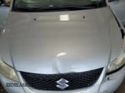 ✅ 2009 Suzuki SX4 Man Sport Touring Pkg FWD • VIN: JS2YC417X96201594 • Lot: 66200595. Listed on Copart with 173,704 mi. Free auction sales archive from the USA and detailed vehicle history report at DreamBid. Image 11.