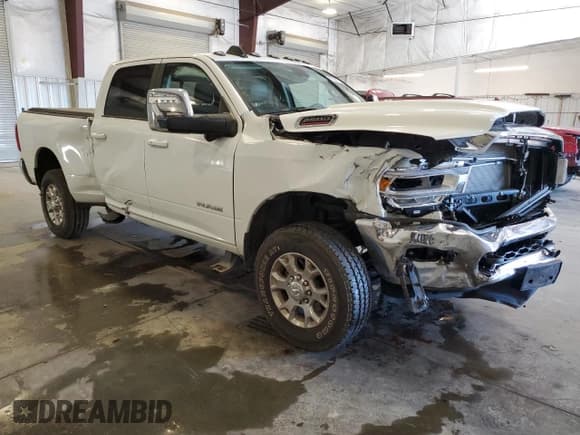 ✅ 2024 Ram 2500 Laramie • VIN: 3C6UR5FJ2RG231468 • Lot: 87484775. Listed on Copart with 7,097 mi. Free auction sales archive from the USA and detailed vehicle history report at DreamBid. Image 4.
