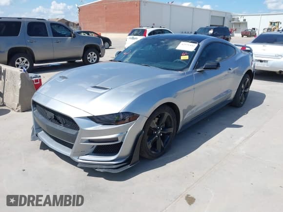 ✅ 2021 Ford Mustang EcoBoost • VIN: 1FA6P8TH6M5134077 • Lot: 42571442. Wystawiony na IAAI z przebiegiem 92 397 mil. Bezpłatny archiwum sprzedaży aukcyjnych z USA i szczegółowy raport historii pojazdu na DreamBid. Zdjęcie 2.