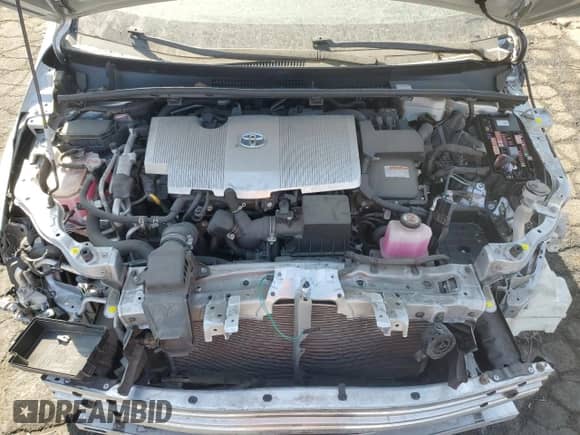 2022 Toyota Prius LE с VIN JTDKAMFP7N3228892, выставлен на аукционе Copart как лот 69565485 с пробегом 23 576 миль миль и Списание • Salvage title. История ставок и продаж доступна на DreamBid. Изображение 11.