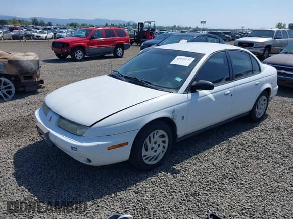 1998 Saturn SL с VIN 1G8ZK5273WZ251392, выставлен на аукционе IAAI как лот 42149274 с пробегом 80 544 миль миль и . История ставок и продаж доступна на DreamBid. Изображение 2.