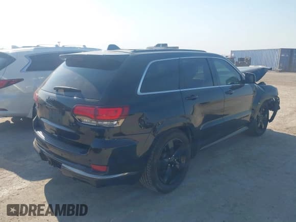 ✅ 2016 Jeep Grand Cherokee Overland • VIN: 1C4RJFCT6GC471673 • Lot: 40584190. Listed on IAAI with 128,482 mi. Free auction sales archive from the USA and detailed vehicle history report at DreamBid. Image 4.