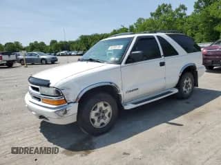 2002 Chevrolet Blazer LS z VIN 1GNCT18W92K222330, wystawiony jako Copart lot #59230195 z przebiegiem Nie podano mil oraz Szkoda całkowita • Salvage title. Historia ofert i sprzedaży dostępna na DreamBid. Obrazek 1.