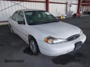 ✅ 1999 Ford Contour LX • VIN: 1FAFP66L7XK208536 • Лот: 43812424. Опубликован ранее на IAAI с пробегом 164 345 миль. Бесплатный доступ к архиву аукционных продаж из США и подробный отчёт об истории автомобиля на DreamBid. Изображение 1.