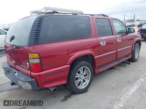 ✅ 2005 Chevrolet Suburban LS • VIN: 1GNEC16Z65J149255 • Lot: 42761528. Listed on IAAI with 165,719 mi. Free auction sales archive from the USA and detailed vehicle history report at DreamBid. Image 4.