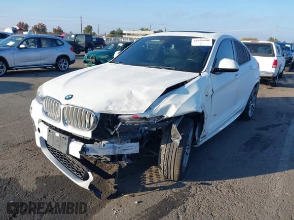 ✅ 2016 BMW X4 xDrive28i • VIN: 5UXXW3C58G0R22594 • Lot: 43550600. Wystawiony na IAAI z przebiegiem 96 471 mil. Bezpłatny archiwum sprzedaży aukcyjnych z USA i szczegółowy raport historii pojazdu na DreamBid. Zdjęcie 6.