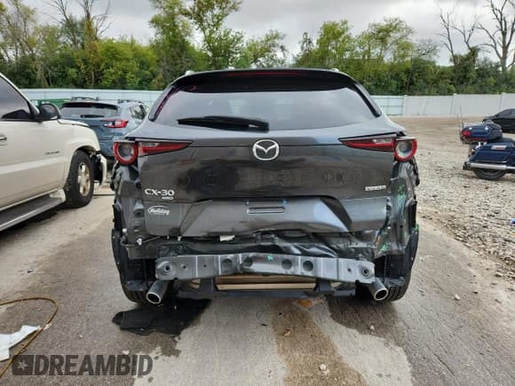 ✅ 2022 Mazda CX-30 S Preferred • VIN: 3MVDMBCL5NM422470 • Лот: 82083615. Опубликован ранее на Copart с пробегом 24 506 миль. Бесплатный доступ к архиву аукционных продаж из США и подробный отчёт об истории автомобиля на DreamBid. Изображение 6.