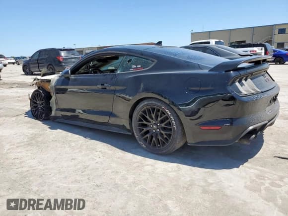 ✅ 2021 Ford Mustang GT • VIN: 1FA6P8CF2M5128534 • Lot: 57757225. Listed on Copart with Not provided. Free auction sales archive from the USA and detailed vehicle history report at DreamBid. Image 2.