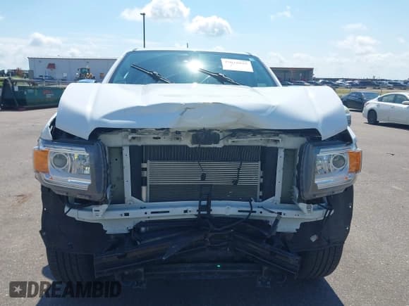 ✅ 2018 GMC Canyon 4WD Denali • VIN: 1GTG6EEN0J1127955 • Lot: 43016855. Listed on IAAI with 99,020 mi. Free auction sales archive from the USA and detailed vehicle history report at DreamBid. Image 13.