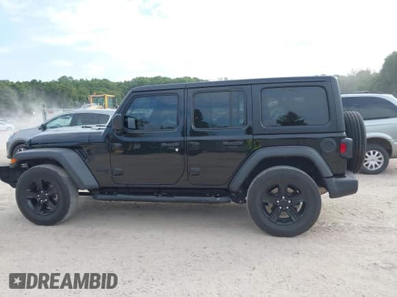 ✅ 2022 Jeep Wrangler Unlimited Sport S • VIN: 1C4HJXDG7NW195681 • Lot: 43256297. Listed on IAAI with 48,954 mi. Free auction sales archive from the USA and detailed vehicle history report at DreamBid. Image 14.