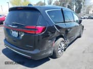 ✅ 2021 Chrysler Pacifica Hybrid Touring L • VIN: 2C4RC1L71MR599631 • Lot: 42151965. Listed on IAAI with 67,401 mi. Free auction sales archive from the USA and detailed vehicle history report at DreamBid. Image 4.