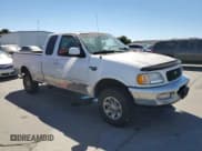 ✅ 1998 Ford F-250 • VIN: 1FTPX28L9WKB01247 • Lot: 70723084. Listed on Copart with 119,870 mi. Free auction sales archive from the USA and detailed vehicle history report at DreamBid. Image 4.