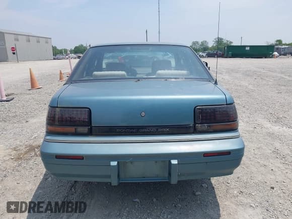 ✅ 1992 Pontiac Grand Prix LE • VIN: 1G2WH54T9NF318762 • Лот: 42480633. Опубликован ранее на IAAI с пробегом 53 773 миль. Бесплатный доступ к архиву аукционных продаж из США и подробный отчёт об истории автомобиля на DreamBid. Изображение 17.
