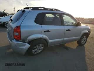 2009 Hyundai Tucson GLS z VIN KM8JM12B29U977896, wystawiony jako Copart lot #81466764 z przebiegiem 168 214 mil mil oraz Szkoda całkowita • Salvage title. Historia ofert i sprzedaży dostępna na DreamBid. Obrazek 3.