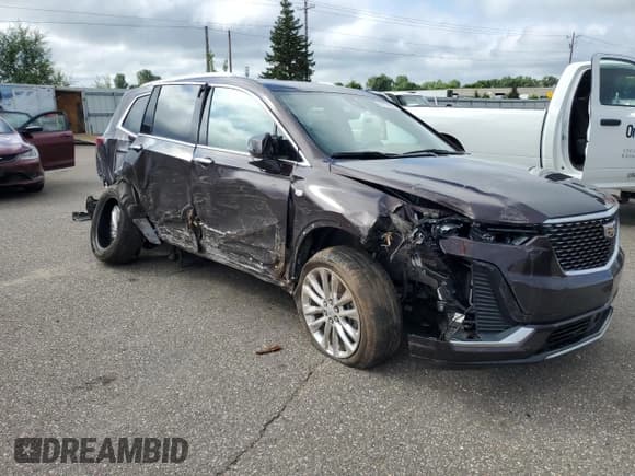 ✅ 2020 Cadillac XT6 FWD Premium Luxury • VIN: 1GYKPERS4LZ158048 • Lot: 65733895. Listed on Copart with 36,065 mi. Free auction sales archive from the USA and detailed vehicle history report at DreamBid. Image 4.
