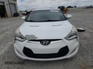 ✅ 2014 Hyundai Veloster • VIN: KMHTC6AD2EU191697 • Lot: 70442365. Wystawiony na Copart z przebiegiem 122 602 mil. Bezpłatny archiwum sprzedaży aukcyjnych z USA i szczegółowy raport historii pojazdu na DreamBid. Zdjęcie 5.