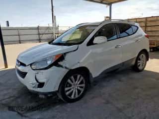2012 Hyundai Tucson Limited z VIN KM8JUCAC1CU519960, wystawiony jako Copart lot #67451415 z przebiegiem 222 008 mil mil oraz Szkoda całkowita • Salvage title. Historia ofert i sprzedaży dostępna na DreamBid. Obrazek 1.