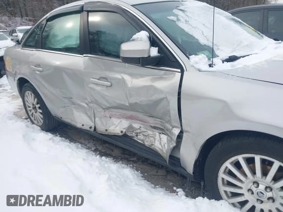 ✅ 2007 Mercury Montego Premier • VIN: 1MEHM42137G602766 • Lot: 41352116. Listed on IAAI with 101,263 mi. Free auction sales archive from the USA and detailed vehicle history report at DreamBid. Image 6.