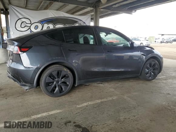 ✅ 2025 Tesla Model Y Long Range • VIN: 7SAYGDED0SF267132 • Lot: 84027995. Listed on Copart with 14,878 mi. Free auction sales archive from the USA and detailed vehicle history report at DreamBid. Image 3.