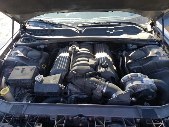 ✅ 2016 Dodge Challenger R/T Scat Pack • VIN: 2C3CDZFJ4GH345659 • Lot: 57662504. Wystawiony na Copart z przebiegiem 110 314 mil. Bezpłatny archiwum sprzedaży aukcyjnych z USA i szczegółowy raport historii pojazdu na DreamBid. Zdjęcie 12.