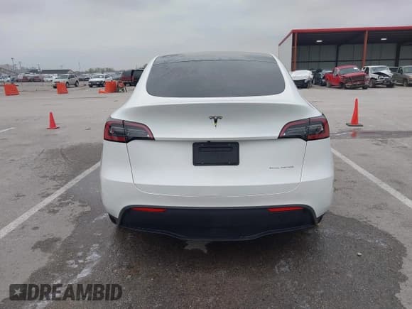 ✅ 2023 Tesla Model Y Long Range • VIN: 7SAYGDEE9PA069095 • Lot: 41986700. Listed on IAAI with 19,484 mi. Free auction sales archive from the USA and detailed vehicle history report at DreamBid. Image 17.