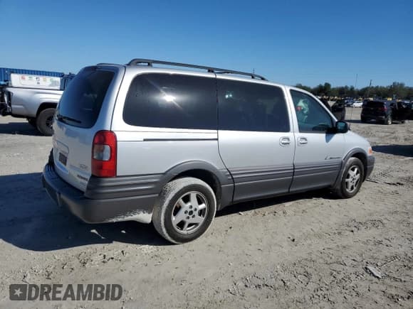 ✅ 2002 Pontiac Montana 1SX • VIN: 1GMDV03E72D193880 • Lot: 42328975. Wystawiony na Copart z przebiegiem 86 980 mil. Bezpłatny archiwum sprzedaży aukcyjnych z USA i szczegółowy raport historii pojazdu na DreamBid. Zdjęcie 3.