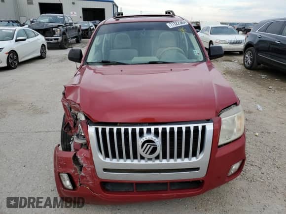 2011 Mercury Mariner z VIN 4M2CN8B77BKJ04820, wystawiony jako Copart lot #77322383 z przebiegiem Nie podano mil oraz Szkoda całkowita • Salvage title. Historia ofert i sprzedaży dostępna na DreamBid. Obrazek 5.