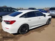✅ 2022 Honda Civic Sport • VIN: 2HGFE2F55NH603959 • Lot: 43586717. Listed on IAAI with 57,142 mi. Free auction sales archive from the USA and detailed vehicle history report at DreamBid. Image 4.