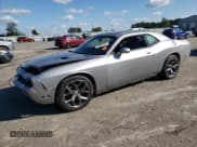✅ 2014 Dodge Challenger SXT • VIN: 2C3CDYAG0EH262085 • Lot: 74202754. Wystawiony na Copart z przebiegiem 148 222 mil. Bezpłatny archiwum sprzedaży aukcyjnych z USA i szczegółowy raport historii pojazdu na DreamBid. Zdjęcie 1.