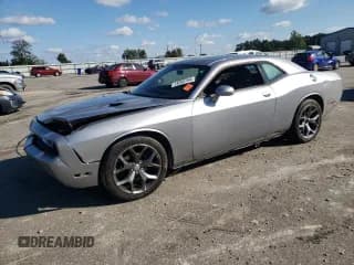 ✅ 2014 Dodge Challenger SXT • VIN: 2C3CDYAG0EH262085 • Lot: 74202754. Wystawiony na Copart z przebiegiem 148 222 mil. Bezpłatny archiwum sprzedaży aukcyjnych z USA i szczegółowy raport historii pojazdu na DreamBid. Zdjęcie 1.