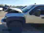 2011 Chevrolet Silverado 1500 LT z VIN 3GCPKSE35BG404711, wystawiony jako IAAI lot #43175333 z przebiegiem 234 937 mil mil oraz . Historia ofert i sprzedaży dostępna na DreamBid. Obrazek 19.