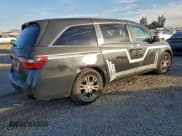 ✅ 2011 Honda Odyssey EX-L • VIN: 5FNRL5H63BB051288 • Lot: 94717645. Listed on Copart with 299,482 mi. Free auction sales archive from the USA and detailed vehicle history report at DreamBid. Image 3.